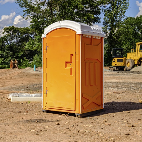 how often are the portable restrooms cleaned and serviced during a rental period in Milam County